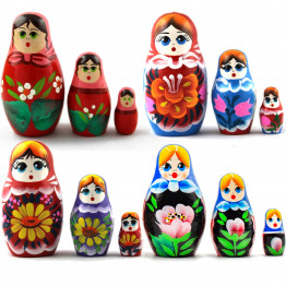 Set of mini nesting dolls with flowers and strawberries